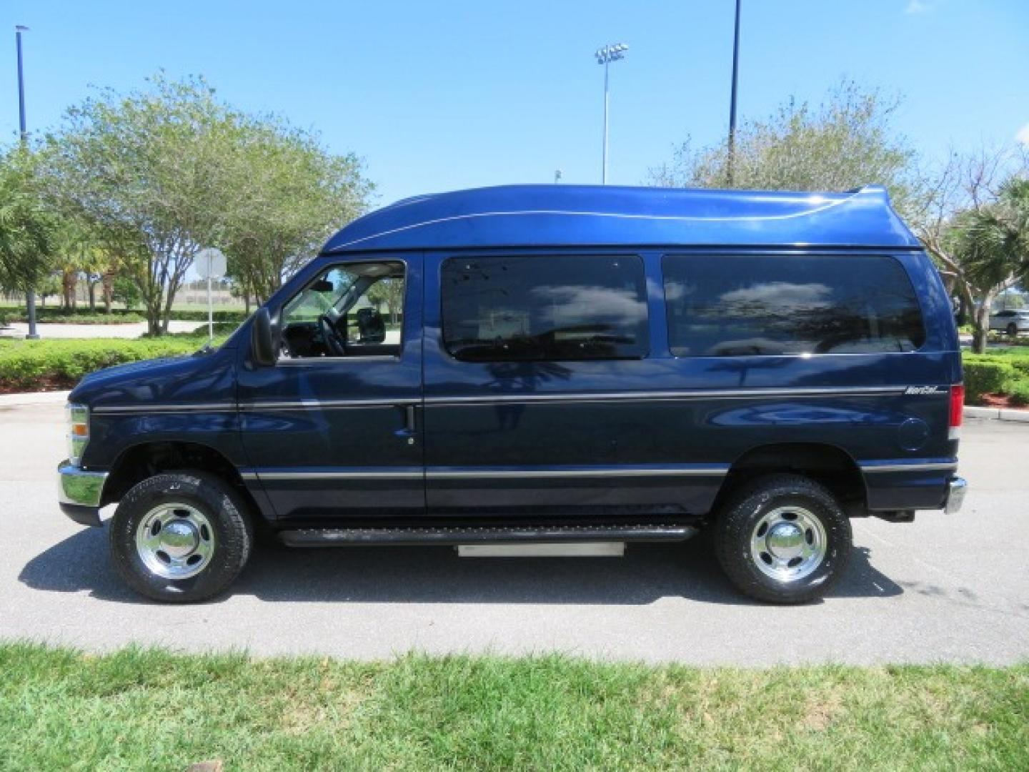 2011 Dark Blue /Gray Ford E-Series Wagon E-350 XLT Super Duty (1FBNE3BS4BD) with an 6.8L V10 SOHC 20V engine, located at 4301 Oak Circle #19, Boca Raton, FL, 33431, (954) 561-2499, 26.388861, -80.084038 - You are looking at a Gorgeous 2011 Ford Econoline E350 XLT Norcal Max High Top Handicap Wheelchair Conversion Van with 6.8L V10, 15K Original Miles, 9 Inch Lowered Floor, Braun UVL Side Entry Wheelchair Lift, Remote Control Power Side Entry Doors, Expanded Side Entry Doors, Q Straint Tie Down, Syste - Photo#22